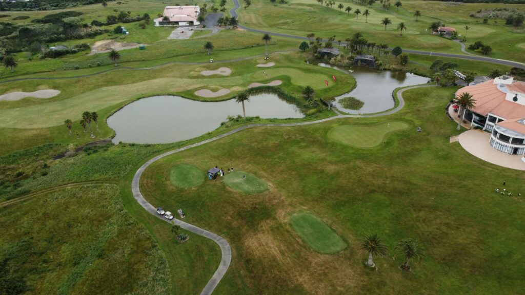 10. Course Name: The Grand Finale - A stunning view of the Grand Finale course showcasing its landscape and bunkers. Perfect for golf courses in Dungeness.