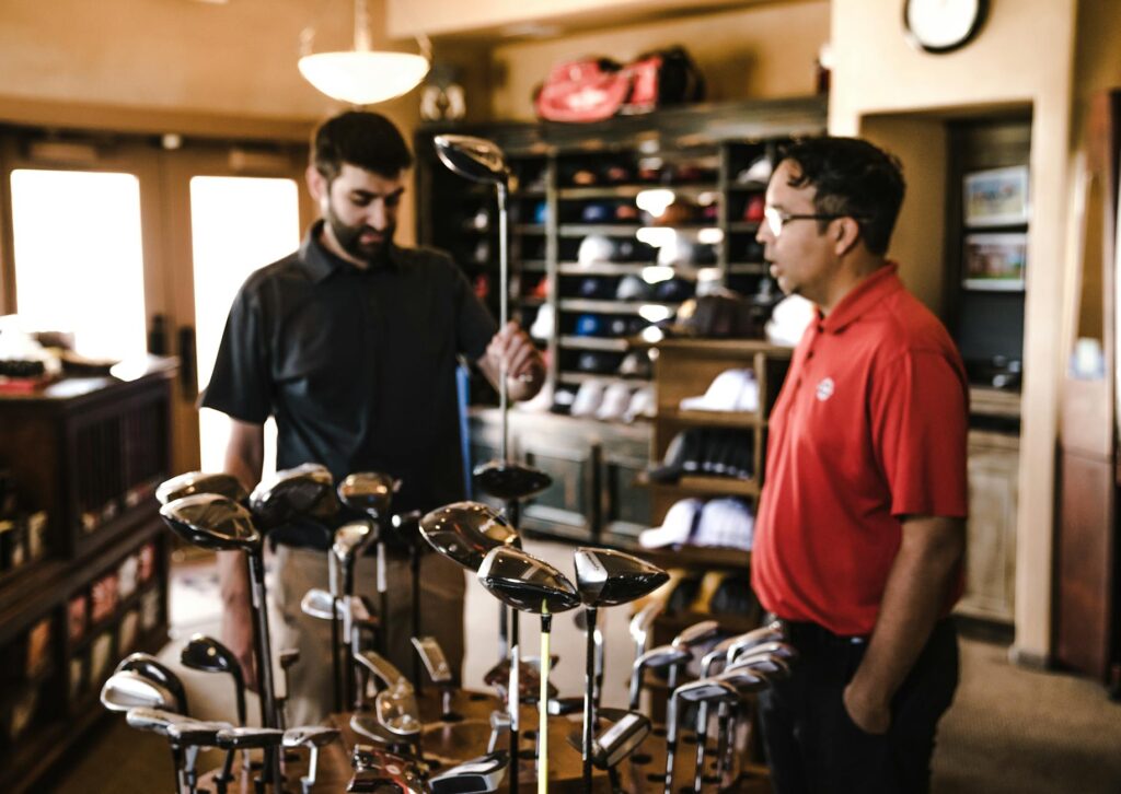 A custom fitting session at a golf shop with a focus on selecting the best golf driver for high handicappers