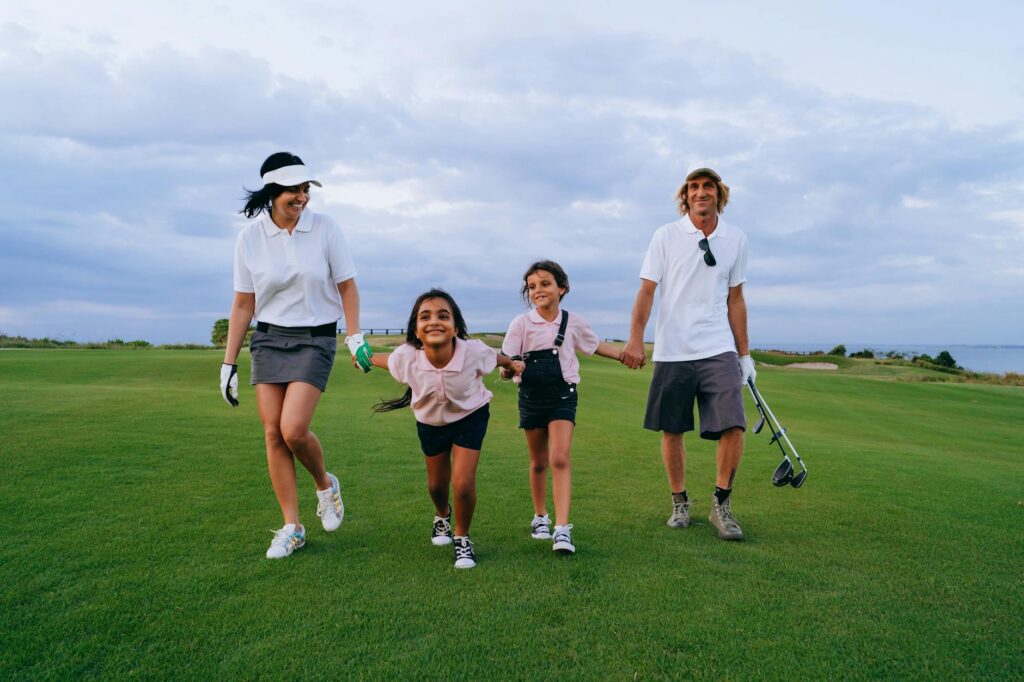 A family playing golf together on a course in Dungeness, emphasizing family-friendly options. — golf courses in Dungeness
