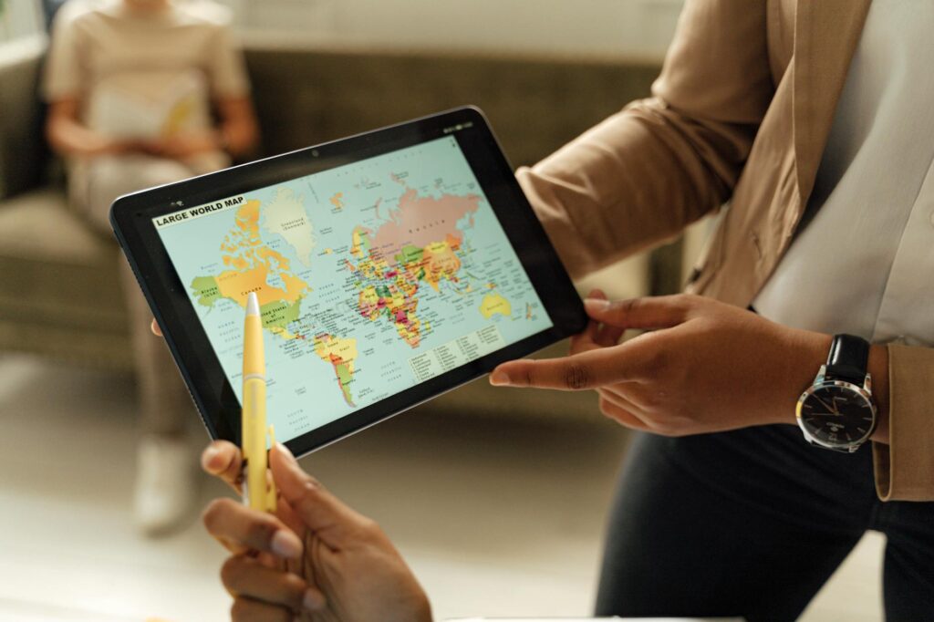 A golfer looking at a radar map on a tablet while preparing to tee off. — technology weather golfing