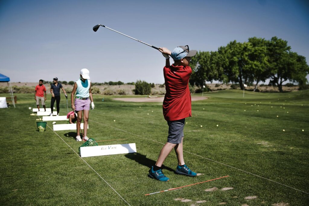 A group of beginners practicing their swings at a Dungeness golf course. — beginner golf Dungeness