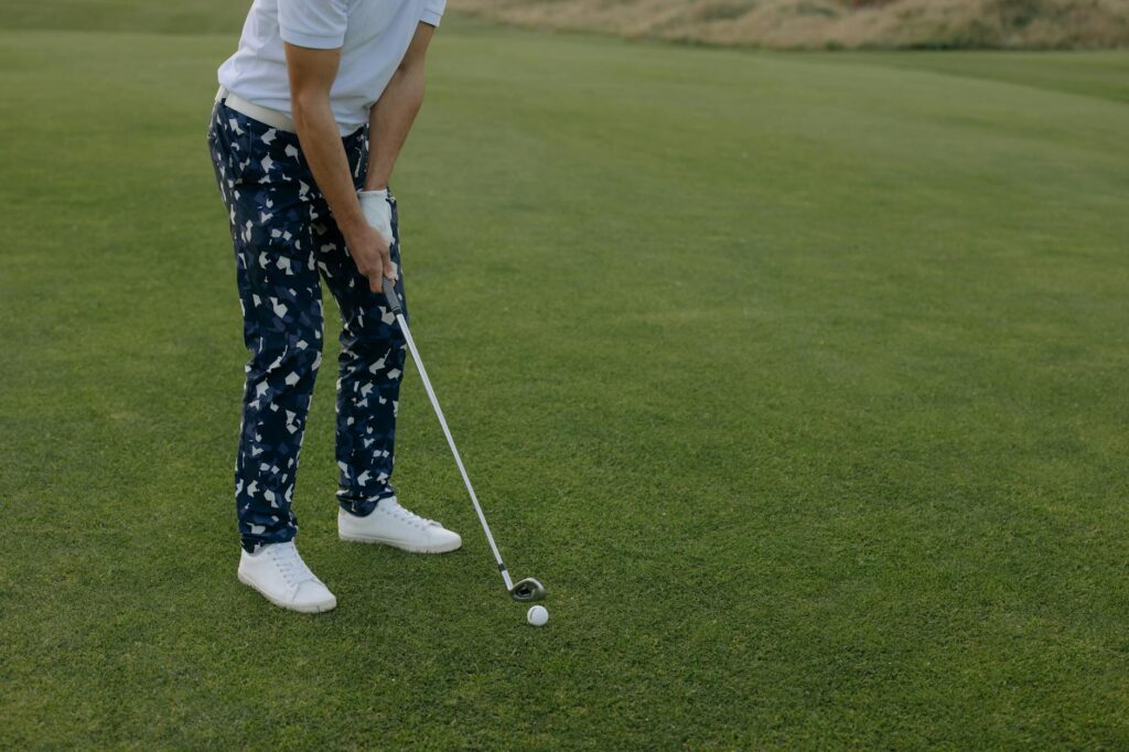 A golfer practicing their short game on the Dungeness greens. — golf tips Dungeness