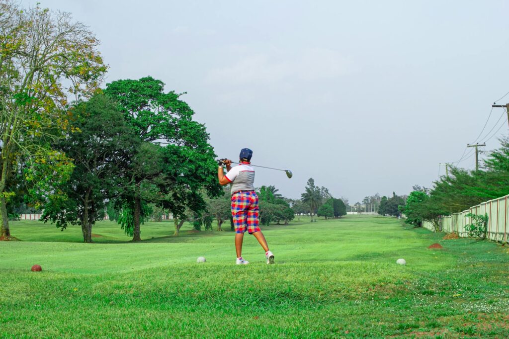 A golfer teeing off at one of the Dungeness golf tournaments. — Dungeness golf tournaments 2026