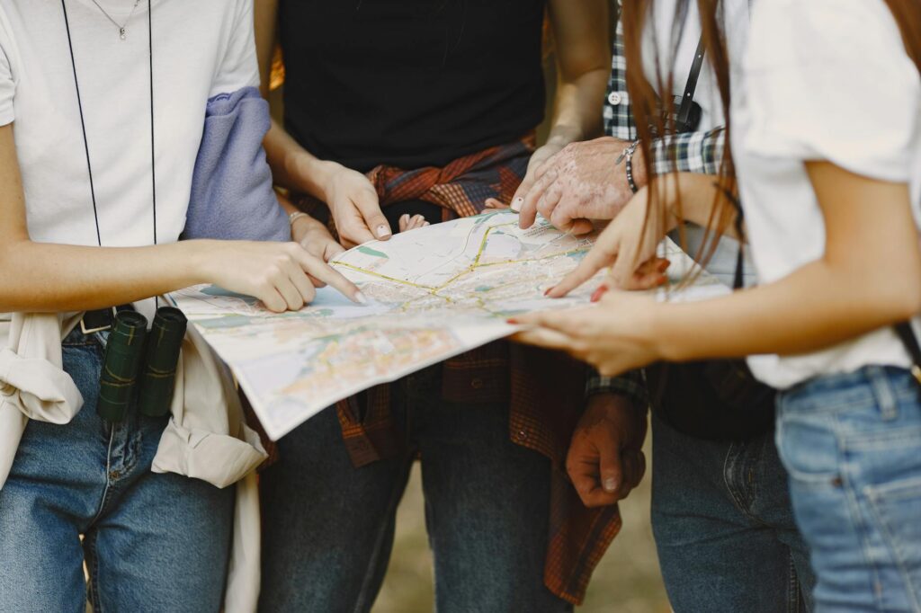 A group of friends planning their golf trip in a scenic California location. — best public golf courses California