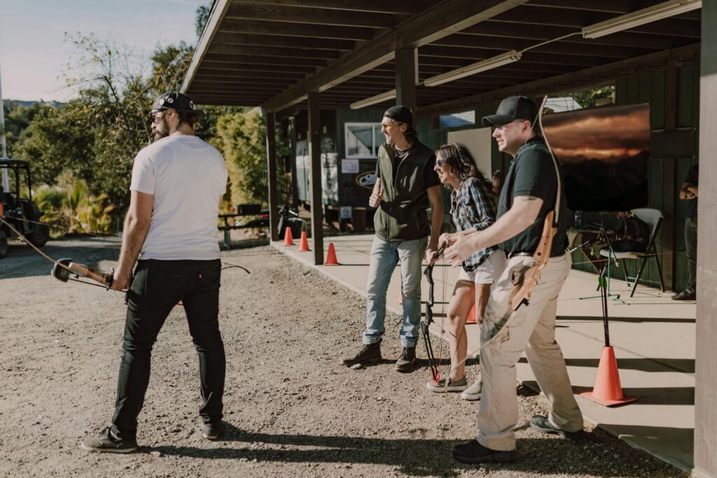 A group of golfers engaged in a practice session, highlighting camaraderie and learning. — golf swing tips Dungeness