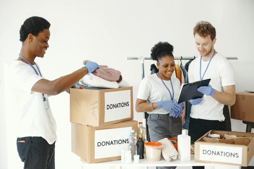 A group of volunteers setting up for a charity golf event. — Dungeness golf tournaments 2026