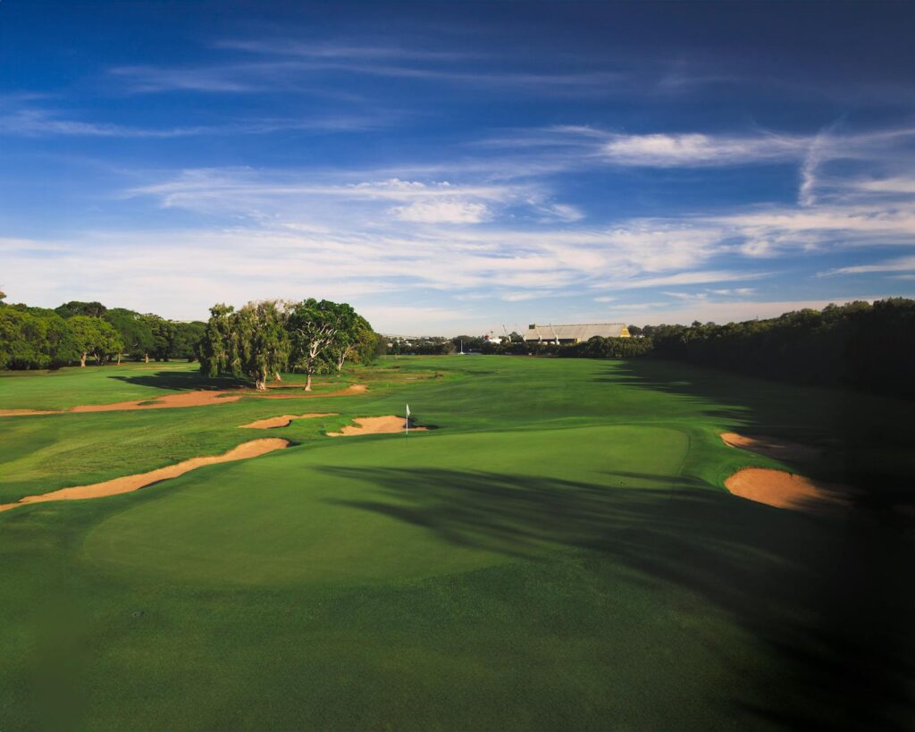 A lush green fairway at Augusta National, highlighting its world-renowned design. — must-play golf courses