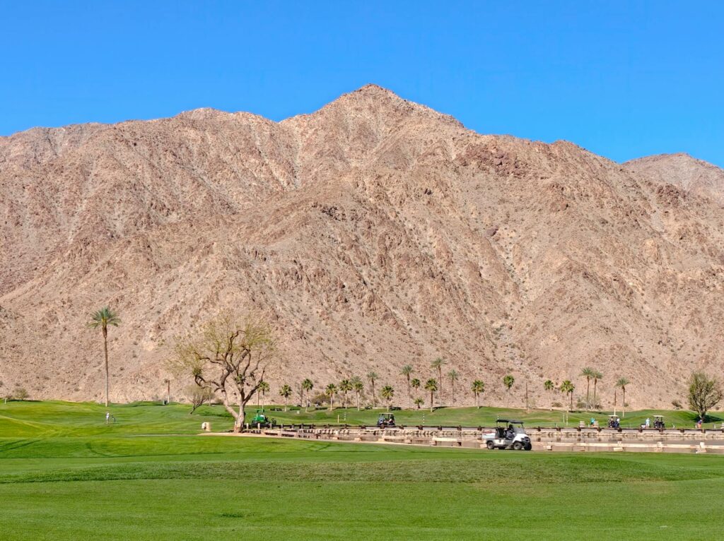 A picturesque Arizona golf course surrounded by desert scenery — winter golf courses