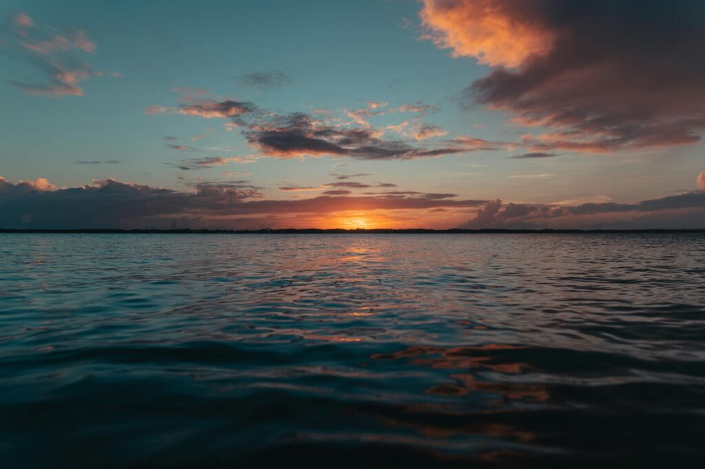 A picturesque sunset over the greens at Sandals Emerald Bay, Bahamas — best golf resorts in the Caribbean