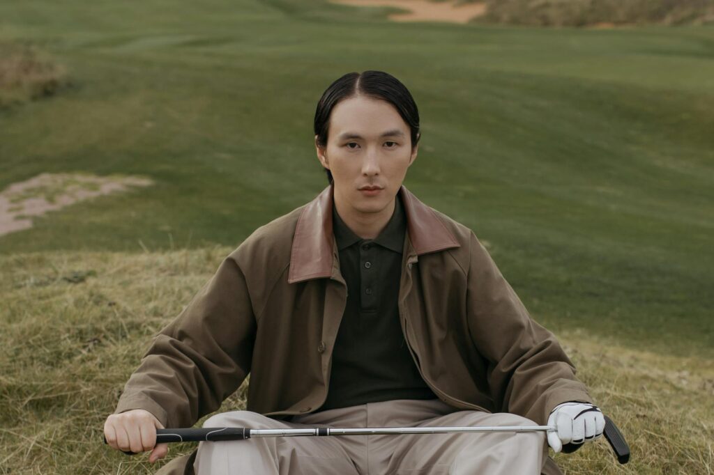 A portrait of a key figure in Dungeness golf history, with a brief description of their contributions to the sport. — hi…