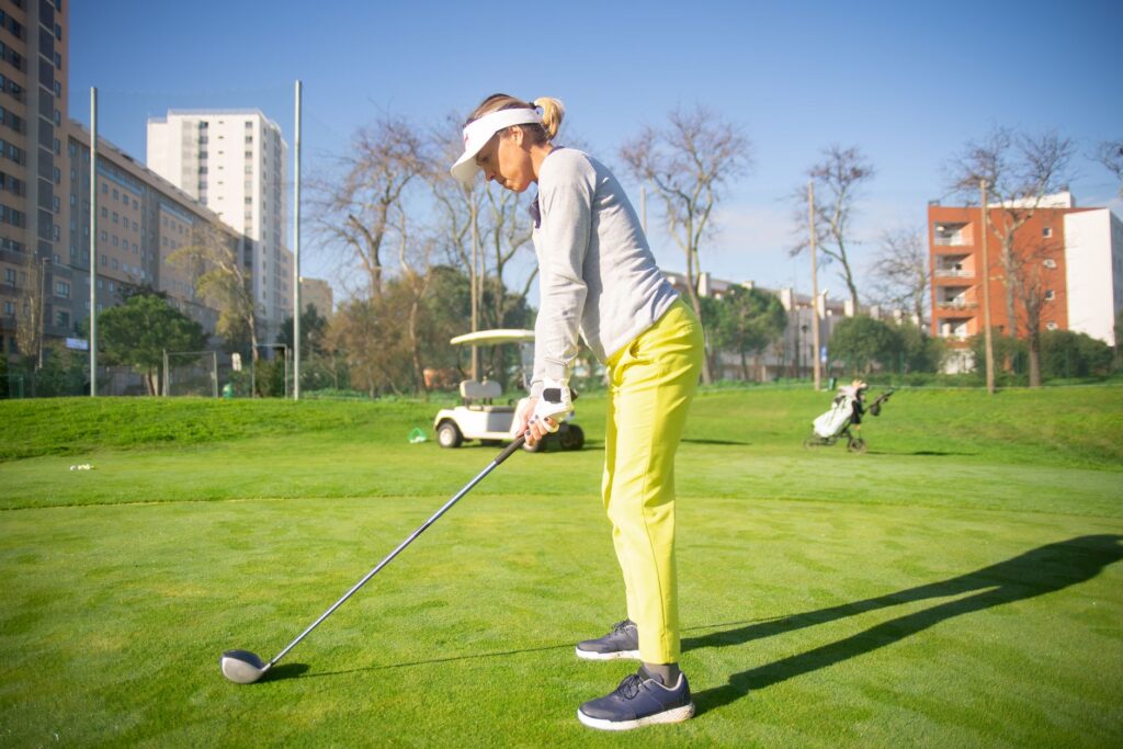 A side view of a golfer's swing path to highlight corrections for how to fix golf slice
