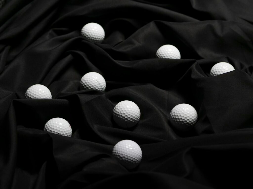 A variety of golf balls designed for use in windy conditions. — golf gear Dungeness