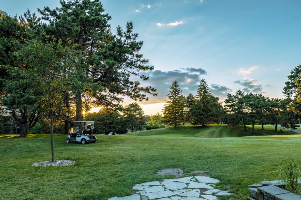 Aerial view of a stunning golf course in Canada during sunset. — best golf courses in Canada