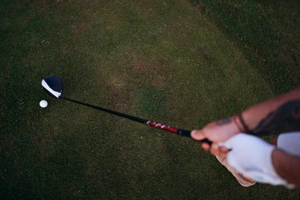 An image of a beginner golfer using a forgiving driver on the course. — forgiving golf drivers for beginners