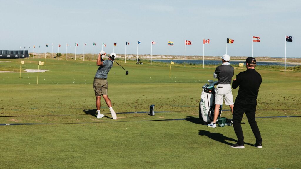Beginner golfer practicing their swing on the Dungeness course. — beginner guide Dungeness golf