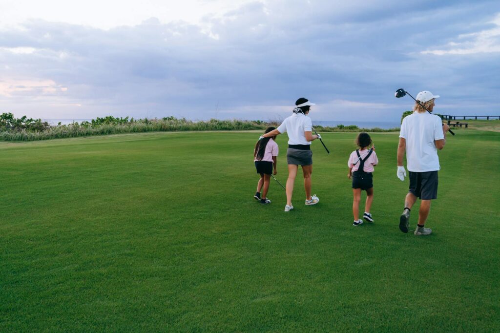 Families playing together at Pinehurst No. 2, one of the best golf courses for women.