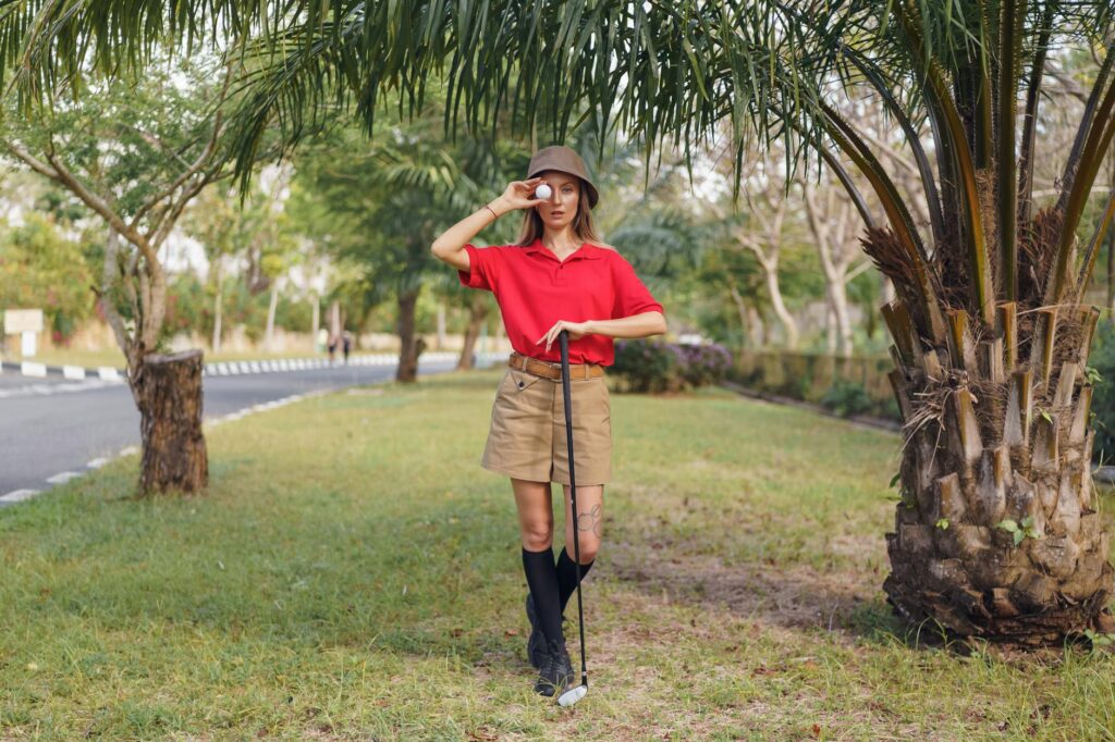 Golfers dressed appropriately in polo shirts and khakis, illustrating the expected dress code. — golf etiquette Dungeness