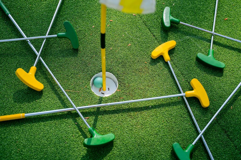 Kids participating in a mini-golf contest at a family-friendly facility. — golf courses for families