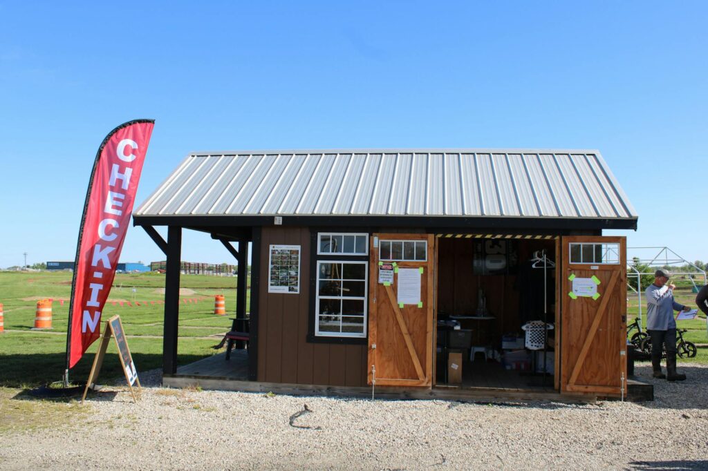 The registration booth at a Dungeness golf competition — Dungeness golf tournaments 2026
