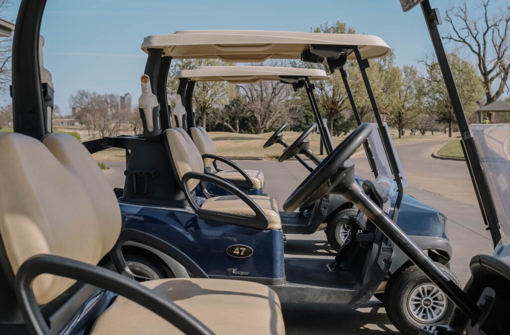 A close-up of a golf cart parked properly, illustrating the correct use of golf carts. — Dungeness golf etiquette