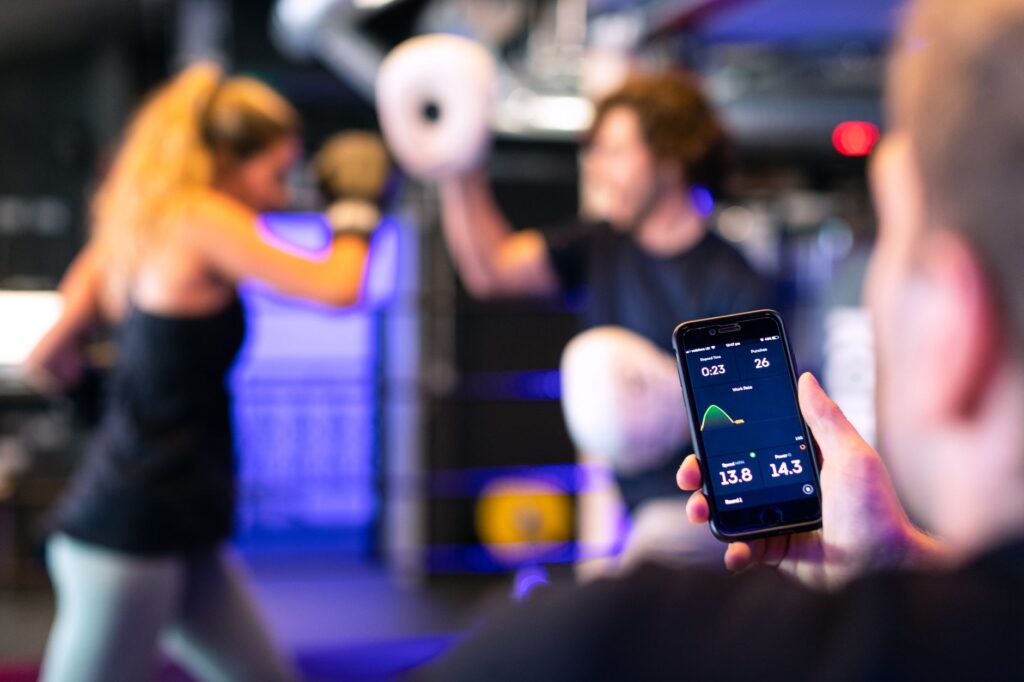A golfer using a training app to track their progress. — golf practice routine