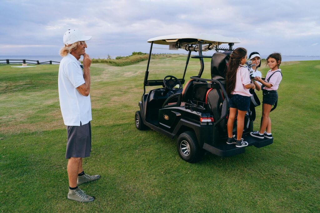 A local instructor giving a golf lesson to a group of beginners in Dungeness. — golfing in Dungeness