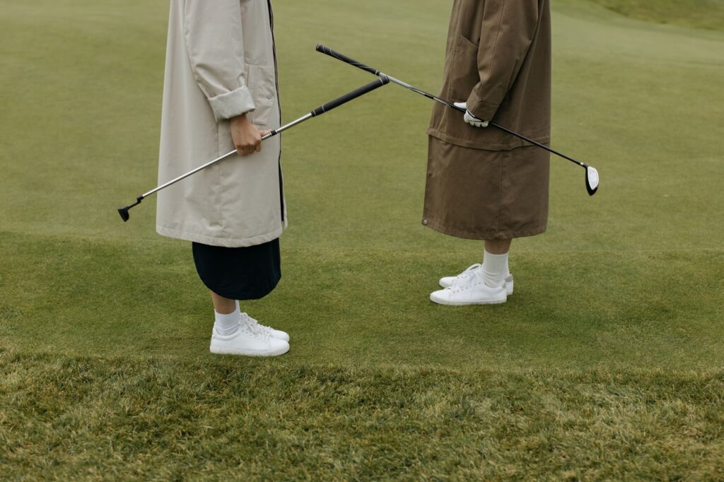 A pair of stylish and comfortable golf shoes on a grassy course — best golf shoes