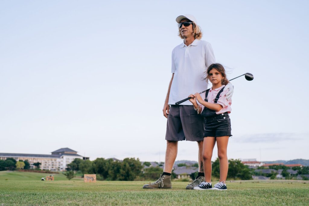 An illustration of a beginner golfer receiving guidance on getting their first handicap. — golf handicap explained
