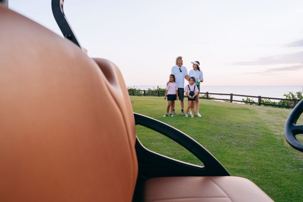 Golf clubs and equipment set out for a family outing — family golf Dungeness