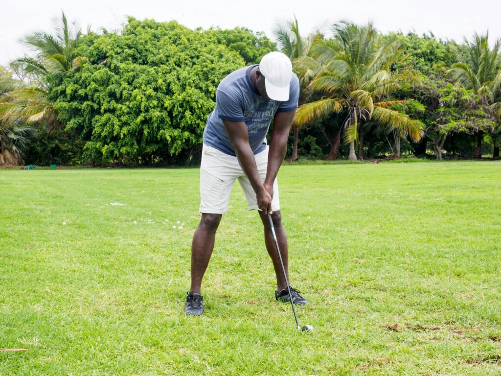 Image showing the correct stance for a consistent golf swing. — golf swing basics