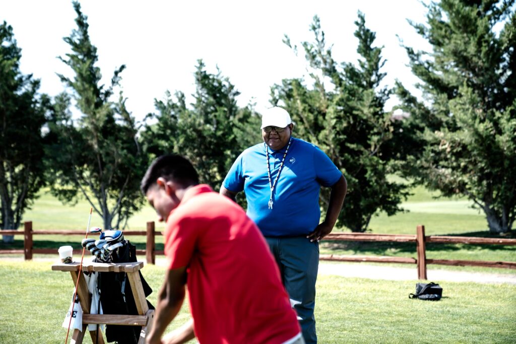 Participants registering for a Dungeness golf tournament at the clubhouse — Dungeness golf tournaments