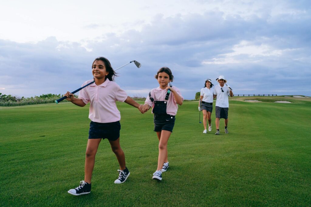 Sandy Shores Golf Club with families playing together. — golf courses in Dungeness