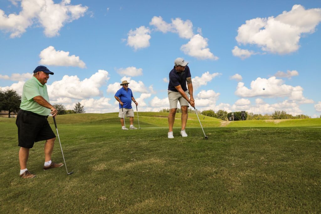 A friendly group of golfers enjoying a game at Dungeness. — beginner Dungeness golf tips