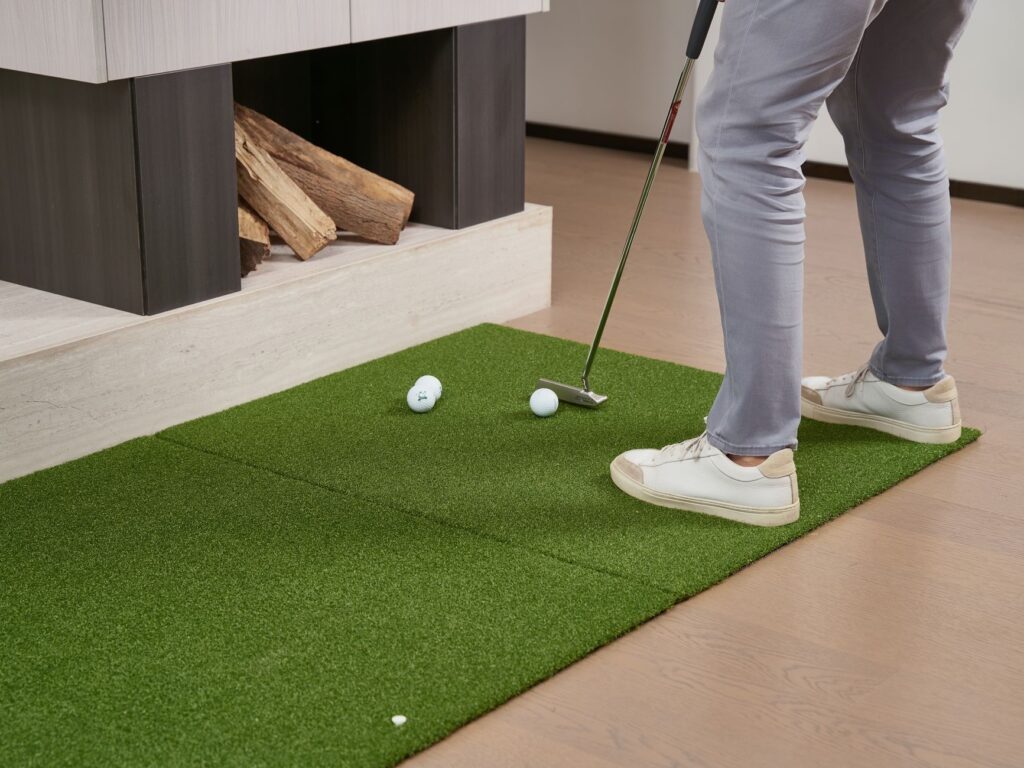 A golfer executing a chipping drill in an open area. — golf practice routine