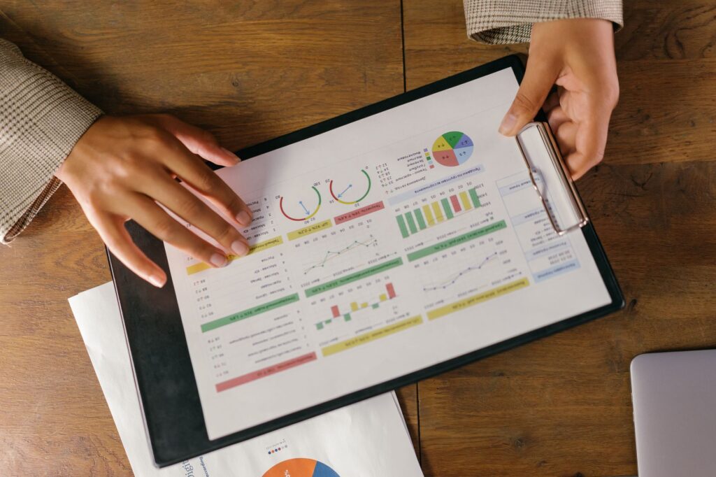 A golfer studying their performance statistics after a match. — become pro golfer