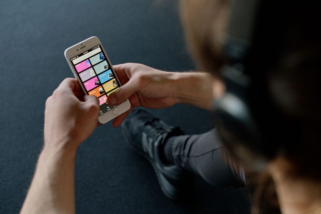 A golfer using a fitness app to track their progress. — train like pro golfer