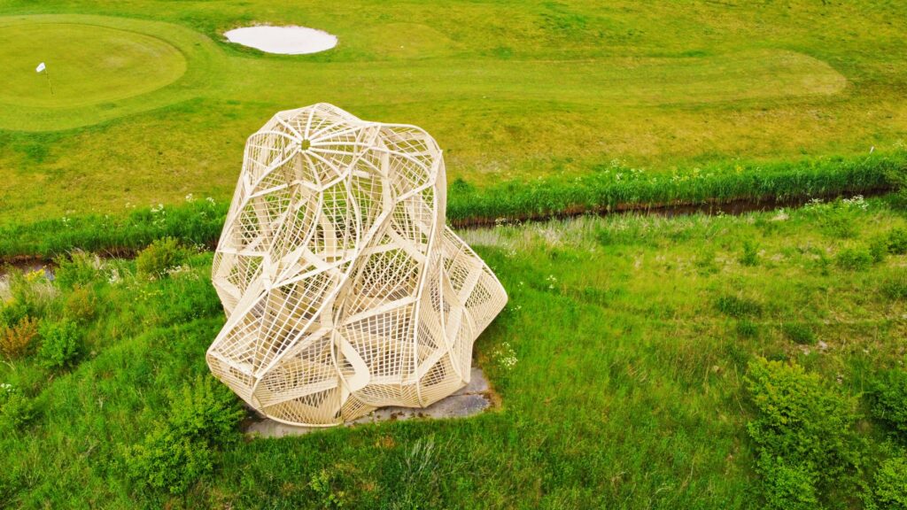 A stunning aerial view of a Dungeness golf course, showcasing its unique design and landscape. — unique features Dungene…
