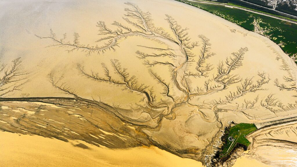 An aerial shot of the Dungeness landscape showcasing its natural beauty. — Dungeness golf course terrain