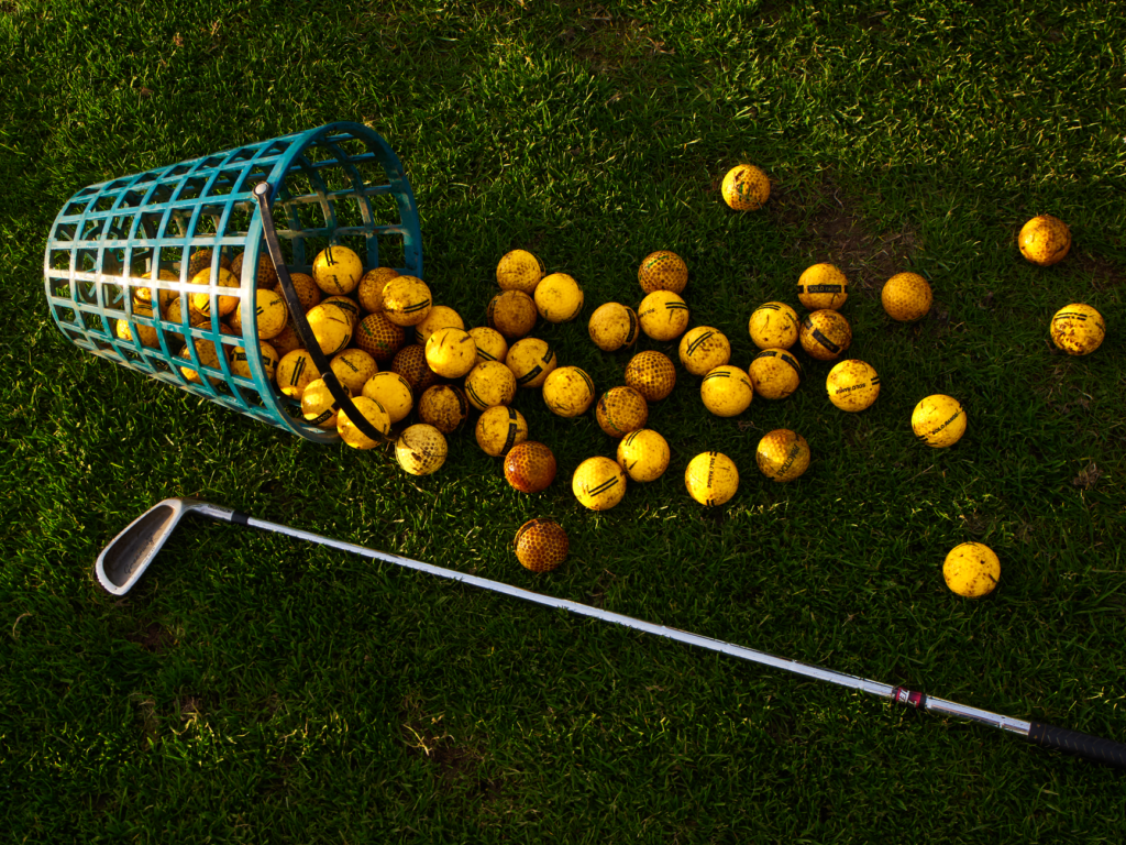 An array of 2026 golf balls from various brands, showcasing their unique features and suitability as the best golf gear Dungeness.