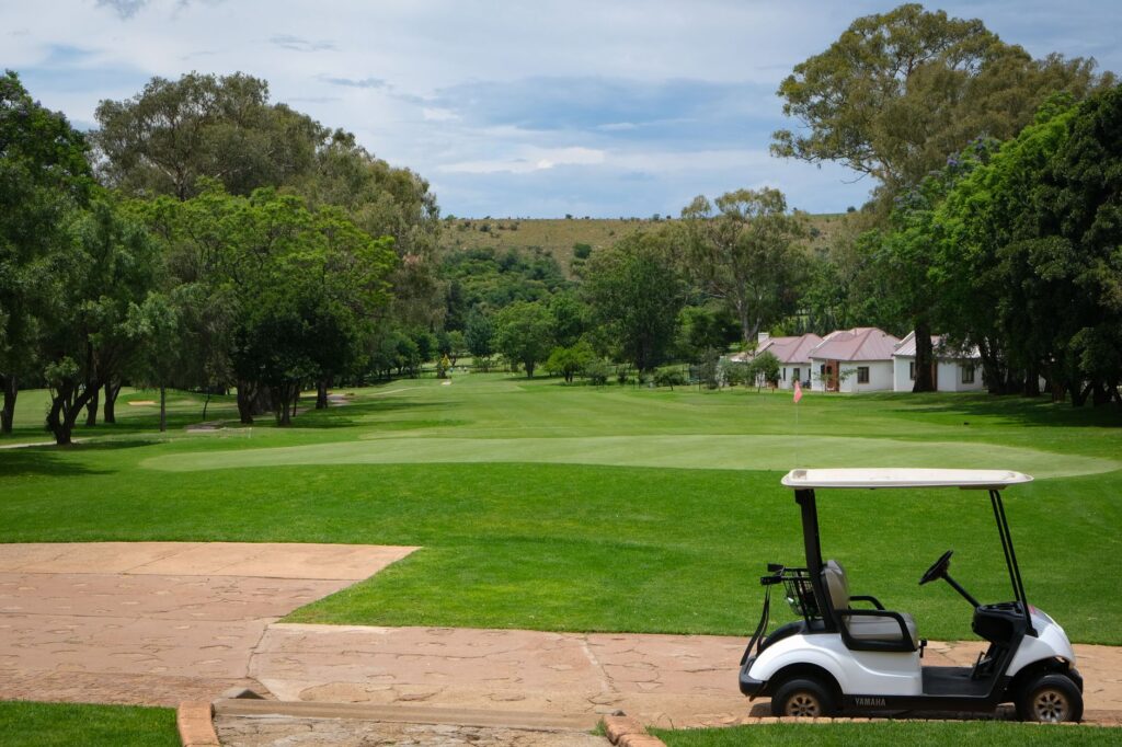 An elegant clubhouse at a private golf course, showcasing membership amenities. — Dungeness public vs private golf courses