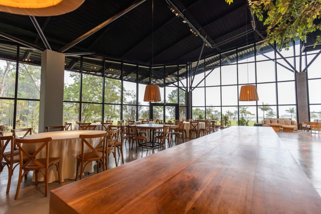 An image of the clubhouse interior, highlighting the dining area and social spaces with Dungeness Golf unique features.