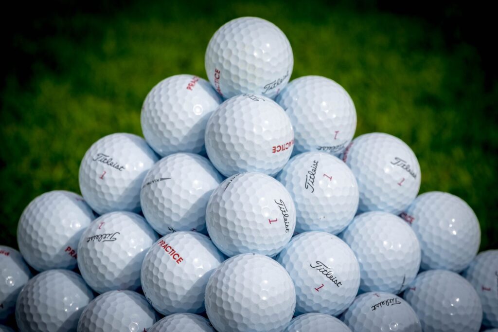 Close-up of top-rated golf balls suitable for Dungeness, showcasing the best golf equipment Dungeness
