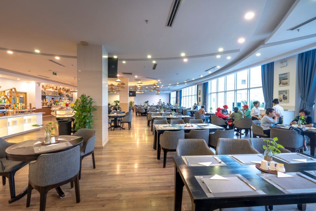 Dining area at Dungeness Golf Course with happy patrons — Dungeness Golf Course tips