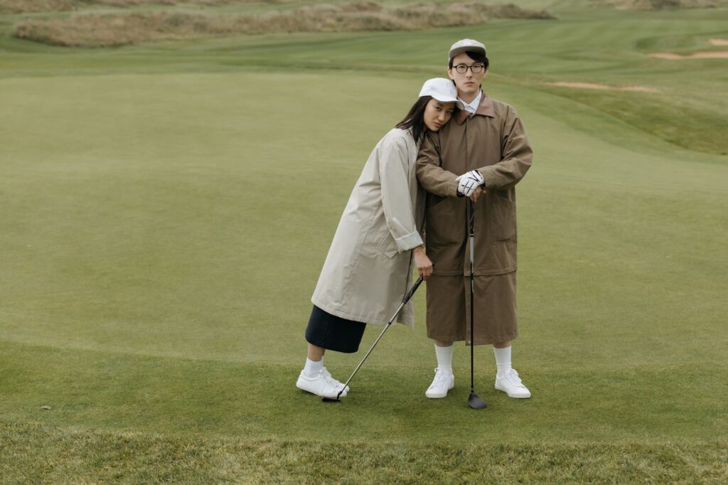 Modern players enjoying a round of golf in Dungeness, illustrating the community's ongoing love for the sport. — Dungene…