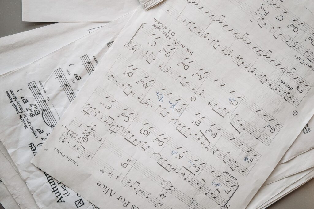 A close-up of a golf scorecard with notes on practice progress. — golf routine tips