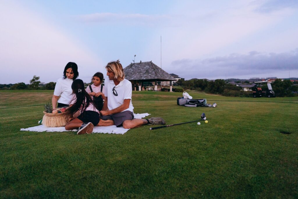 A family enjoying a picnic at the golf course after a game. — family-friendly golf Dungeness