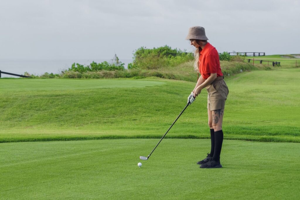 A golfer engaging in mindfulness exercises on the course. — golf practice techniques