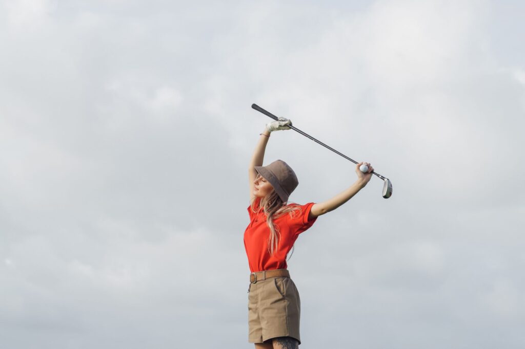 A golfer practicing on a Dungeness course with custom-fitted clubs. — best golf clubs for Dungeness