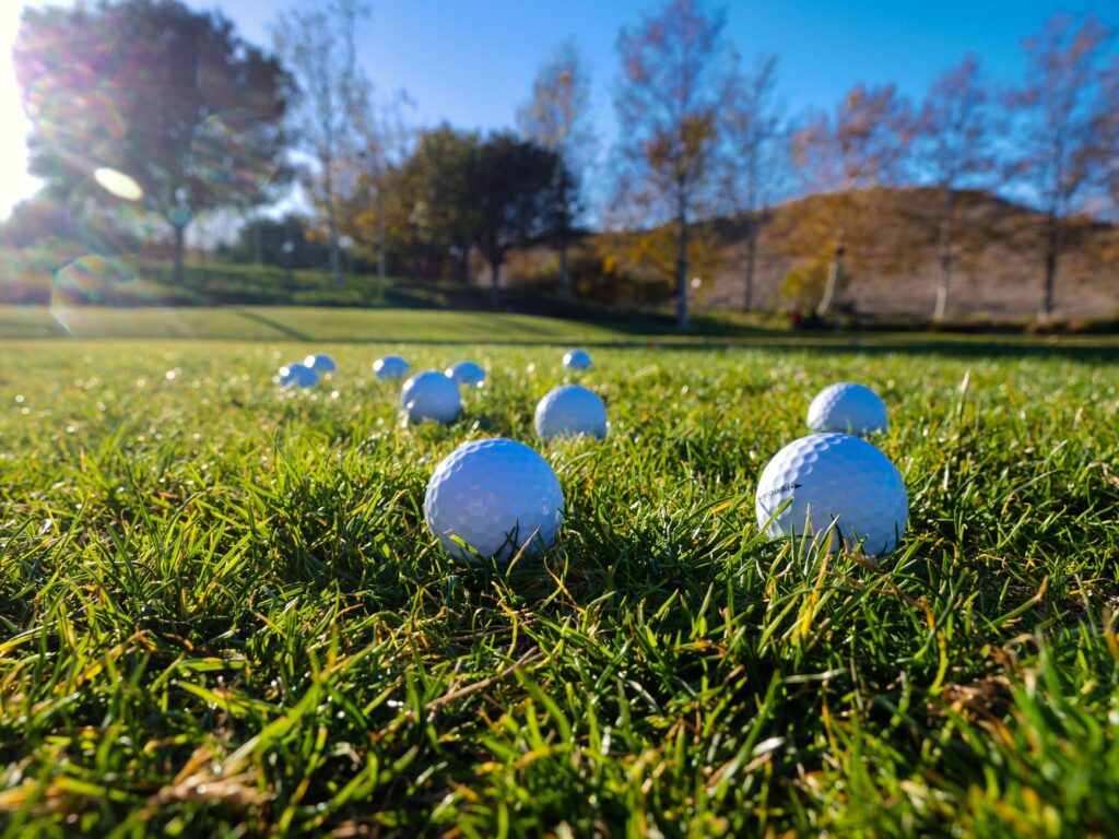 A group of friends enjoying a round of golf on a sunny autumn day in Dungeness. — Dungeness golf fall 2026