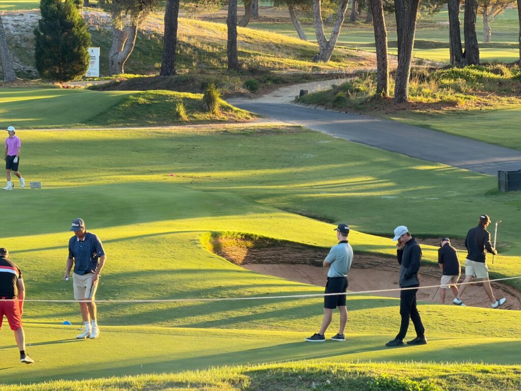 A group of golfers practicing on the range before the tournament — Dungeness golf tournaments